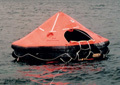 Throw overboard liferafts