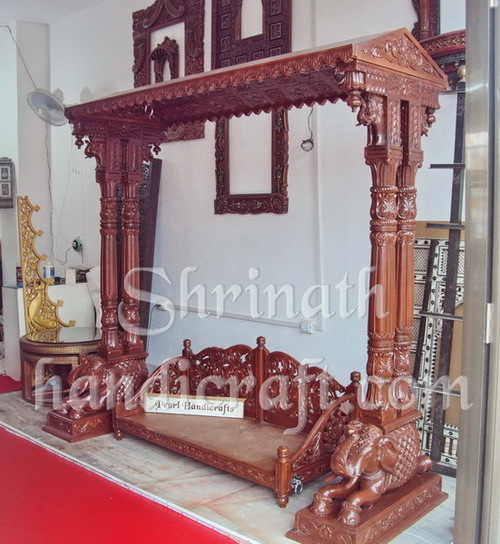 Carved Teak Swings
