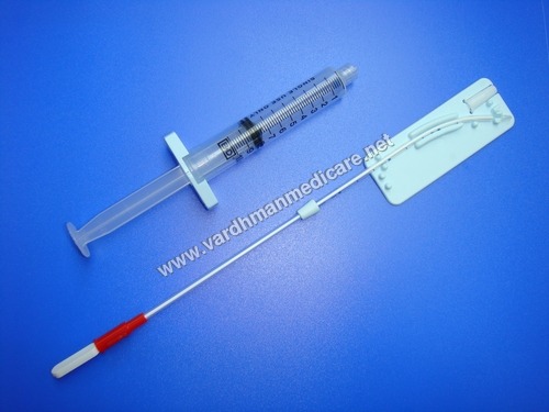 Curette With Syringe