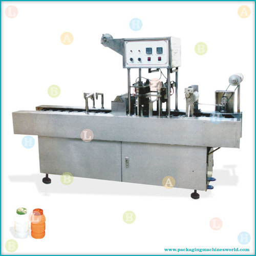 Automatic Mono Block Linear Bottle Filling and Foil Cutting, Placing and Sealing Line