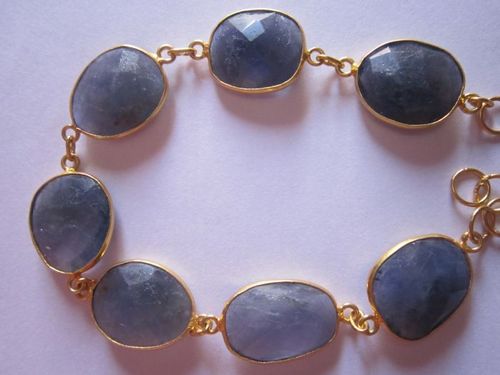 7 pcs. iolite gold vermiel connectors bracelet Approx 56cts. 