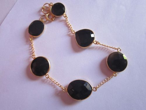 6 pcs. Black onyx gold vermiel connectors bracelet Approx 62cts. 