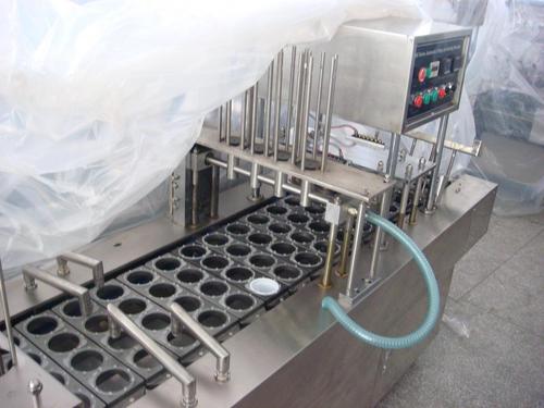 Yogurt Cup Filling And Sealing Machine BG-32 By SOLUTIONS PACKAGING