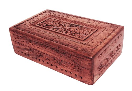 An Intricately Hand Carved Decorative Box With Red Velvet Interiors
