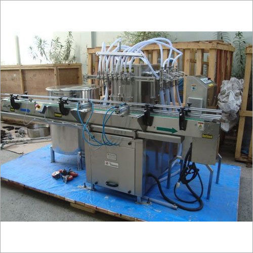 Four Head Volumetric Liquid Bottle Filling Machine