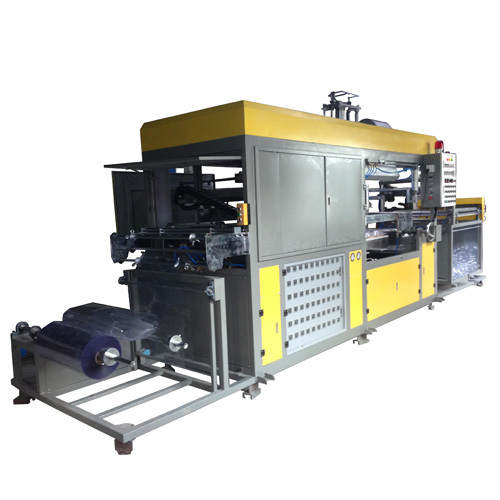 Fully automatic plastic container forming machine