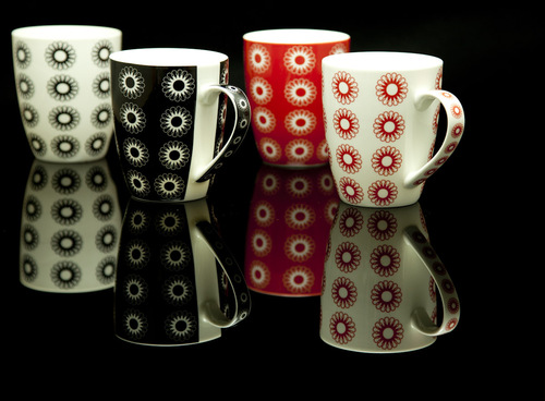 Nucleus lines coffee mug in a matching sleeve