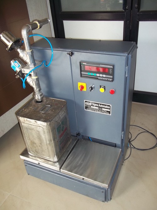 Edible Oil Tin Filling Machine By SIGMA INSTRUMENTATION