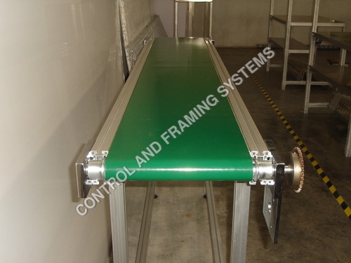 Cleated belt Conveyor By CONTROL AND FRAMING SYSTEMS