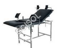 Gynecological Bed - Mild Steel Frame, 1800x550x750 Mm | Hand Lever Adjustment, Three-section Cushioned Top, Pvc Rubber Stumps, Ss Bowls