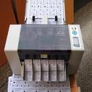 AUTOMATIC CARD CUTTERS