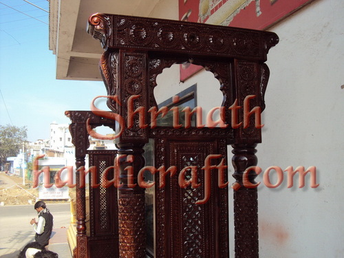 Carved Teak Swings