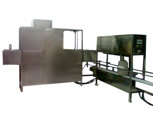 AUTOMATIC JAR RINSING, FILLING AND CAPPING MACHINE