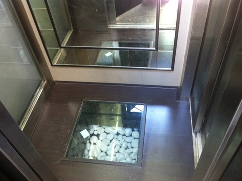 White Pebbles Elevator Flooring