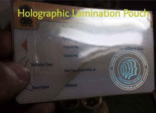 Holographic lamination pouch for paper and plastic cards