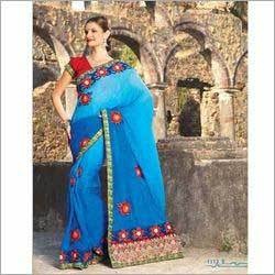 Ladies Sarees - Embroidered Blue Fabric, Bollywood Style | Accurate Stitching, Precise Finish, Trendy Design for All Occasions