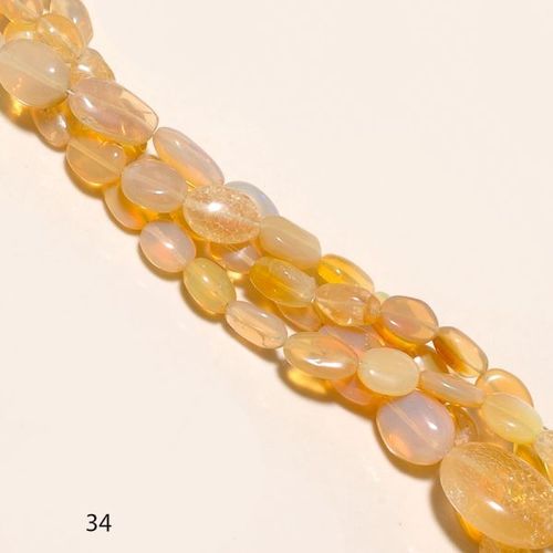 WELO FIRE ETHIOPIAN OPAL - 8X10MM to 6X8MM Oval Beads, Golden and White Color | Elegant Jewelry Beads for Unique Crafting Projects