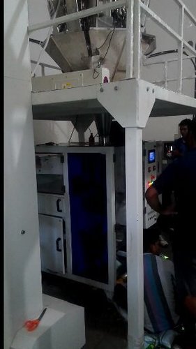 VFFS Bagging Machine - Heat Sealable Materials, 10gms to 500gms Capacity, White Color - Automatic PLC Control, High Accurate Auger Filling System, Safety Guarding System, Static Eliminator