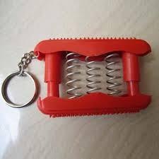 ACi Pocket Exerciser General - Plastic Metal 3x2x1 Inches Red | Acupressure Therapy, Stress Relief, Compact Durable Keychain