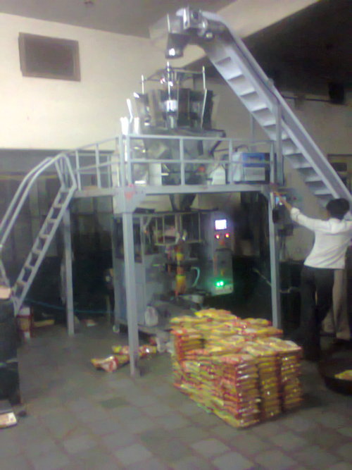 Automatic Vertical Form Fill Seal Packing Machine - 500gms Capacity, 50 Pouches Per Minute | Multi-Head Weigher, PLC Control System, Electric Drive, 1-Year Warranty