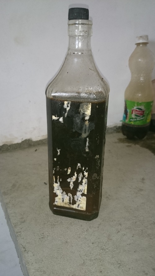 SPENT EARTH OIL