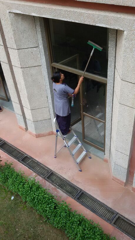 Glass Cleaning By PANJTAN FACILITY MANAGEMENT PVT. LTD.