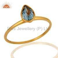 9k Yellow Gold Pear Shaped Blue Topaz Ring