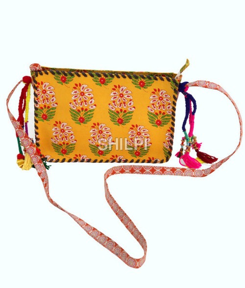 Quick Dry Yellow Printed Sling Bag With Multi Colored Tassles