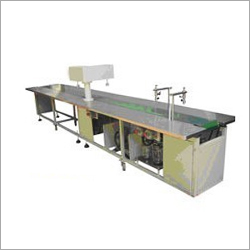 Head Filling & Capping On Conveyor