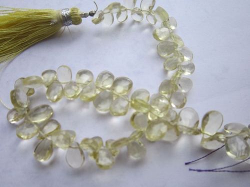 8 inch lemon quartz faceted briolettes beads one strand  5x8mm to 6x9mm 
