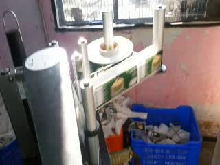 BOTTLE LABELING MACHINE