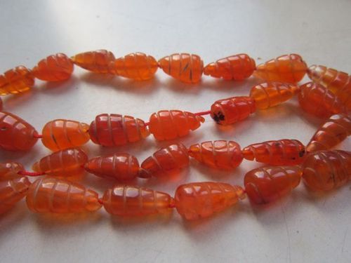 Oval Cut 13 Inch Carnelian Carved Drops Bead One Strand