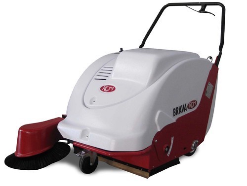 Man Behind Sweeper Machine