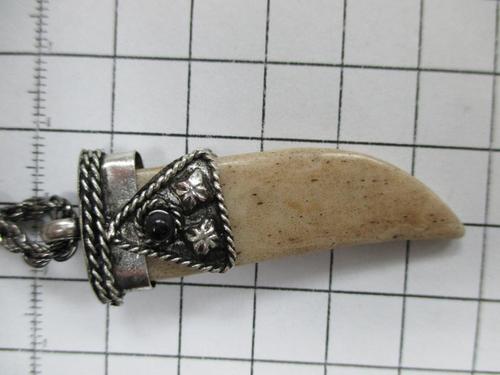 teeth pendant