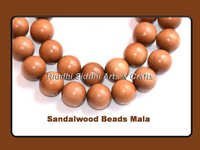 string of sandalwood beads
