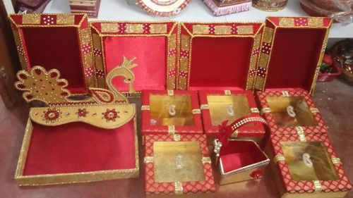 gold and red trousseau packing