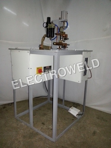 TABLE MOUNTED SPOT WELDER HAVING ELECTRODE HOLDER