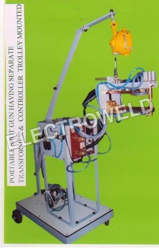 TROLLEY MOUNTED PORTABLE SPOT GUN HAVING SEPERATE