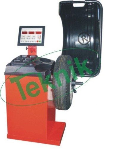 WHEEL BALANCING MACHINE