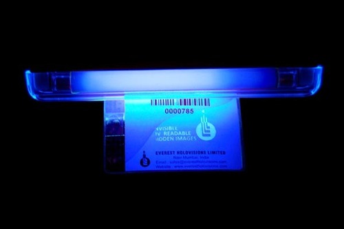 Holographic Integrated Labels with UV readable Image or Text