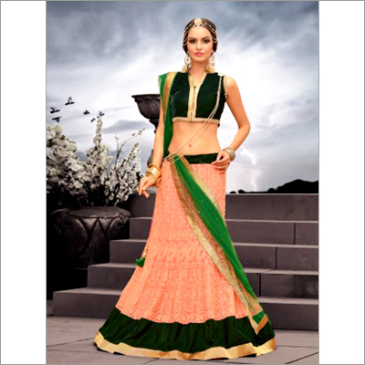 Ethnic Net Lehanga Choli - Crepe Fabric, Customized Size | Breathable, Detergent Resistant, Eye-Catching Orange and Green Design