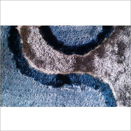 Door mat with carpet finish
