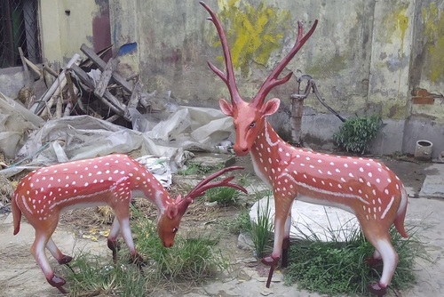 Red And White Deer Statues