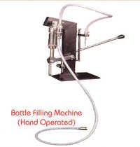 BOTTLE FILLING MACHINE HAND OPERATED
