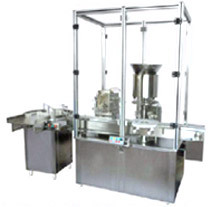 Automatic Liquid Filling Stoppering Machine By DNK PHARMATECH