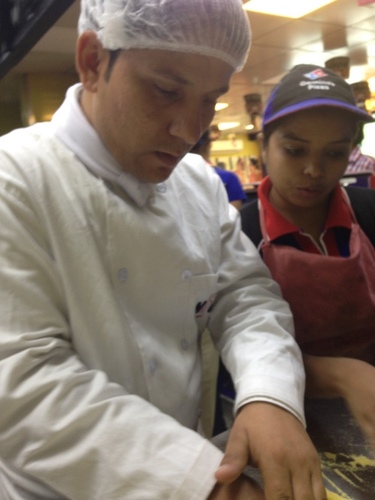 nfci students learning to prepare pizza