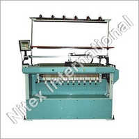 Semi Computerized Flat Bed Knitting Machine