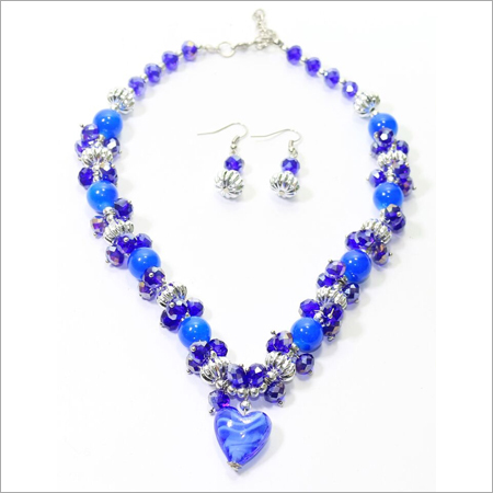Blue Crystal Necklace with heart pendant and Earrings