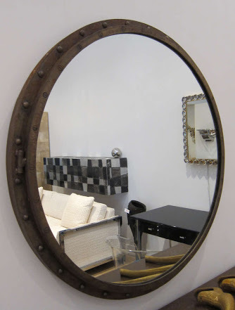 Antique brown shaded brass porthole mirror