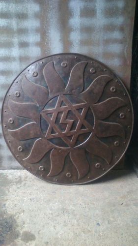 Antique metal shield 